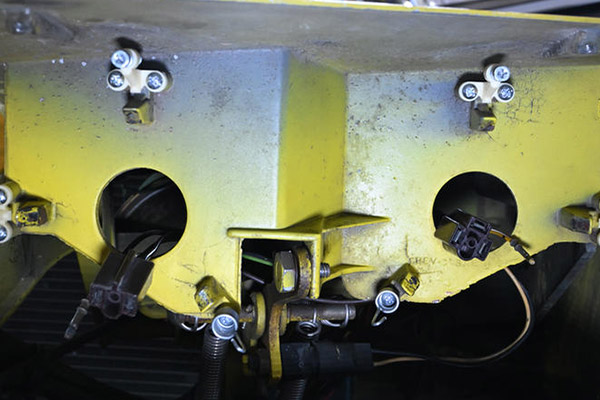 Headlight adjusters installed